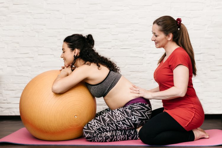 Relieving back pain at pregnancy.