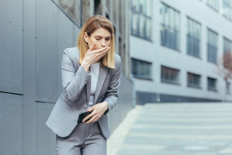 Woman near office nausea and vomiting reflex, sick businesswoman