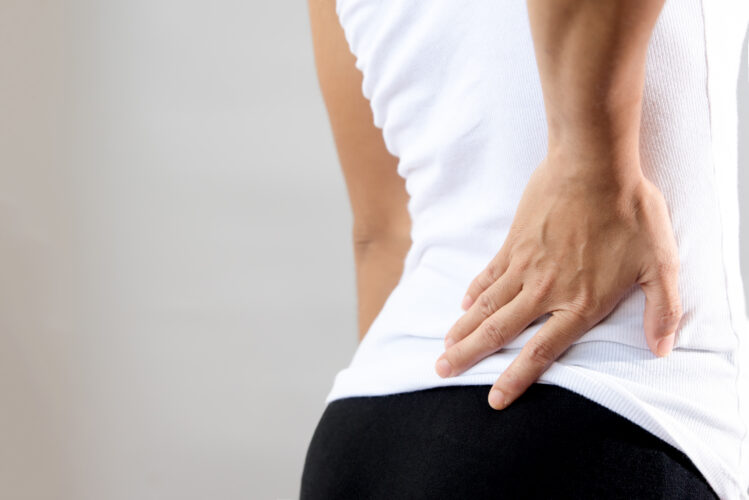low back pain in woman worker